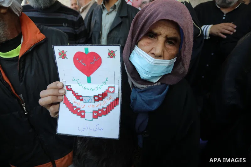Palestinians take part in a protest against the death of prisoner Sami al-Amour in Israeli Jails as a result of intentional medical negligence, in Red cross office, in Gaza city on November 22, 2021. The al-Amour, 39, fr...