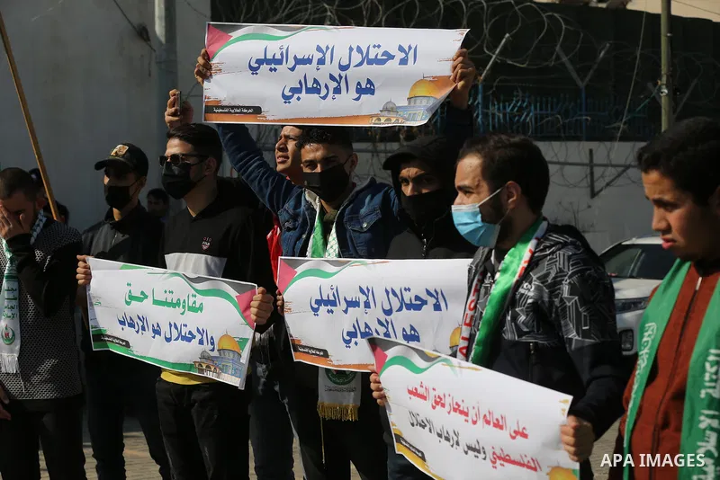 Palestinian students take part in a protest against the British Home Secretary Priti Patel decision to ban Hamas in front of the UNESCO headquarters, in Gaza city on November 22, 2021. Hamas has condemned a move by Brita...