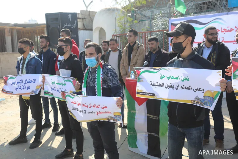 Palestinian students take part in a protest against the British Home Secretary Priti Patel decision to ban Hamas in front of the UNESCO headquarters, in Gaza city on November 22, 2021. Hamas has condemned a move by Brita...