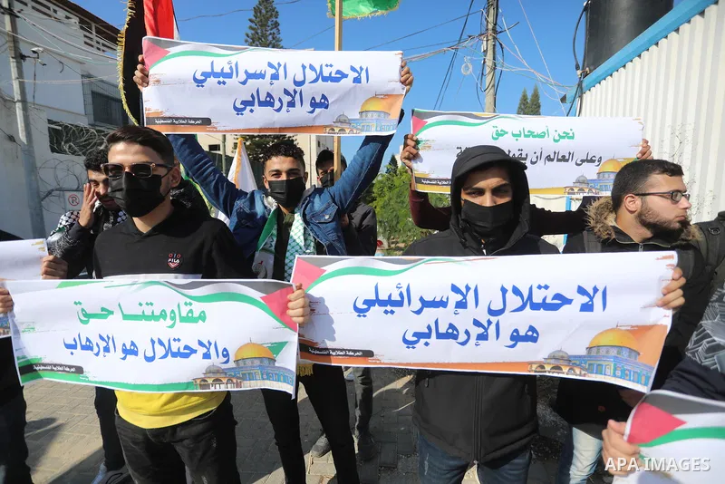 Palestinian students take part in a protest against the British Home Secretary Priti Patel decision to ban Hamas in front of the UNESCO headquarters, in Gaza city on November 22, 2021. Hamas has condemned a move by Brita...