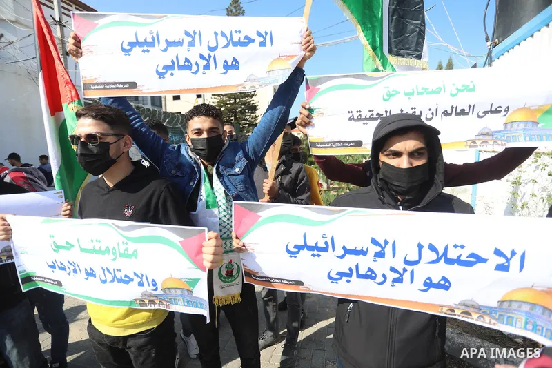 Palestinian students take part in a protest against the British Home Secretary Priti Patel decision to ban Hamas in front of the UNESCO headquarters, in Gaza city on November 22, 2021. Hamas has condemned a move by Brita...
