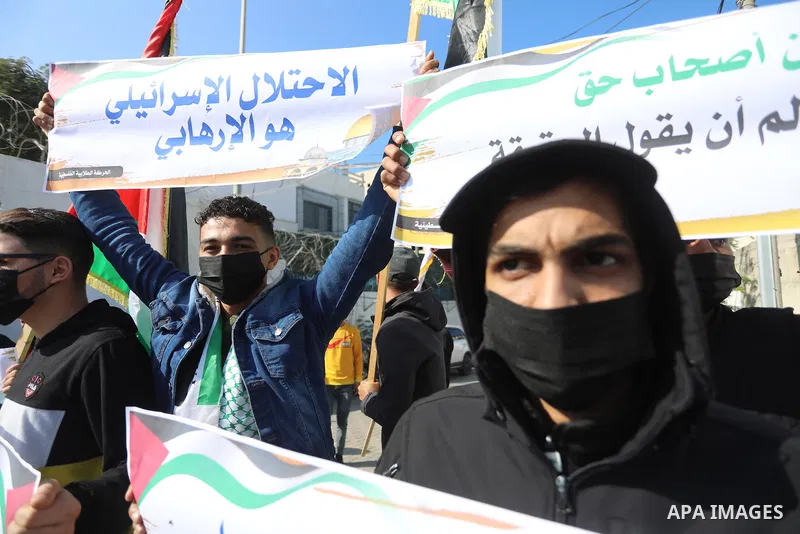 Palestinian students take part in a protest against the British Home Secretary Priti Patel decision to ban Hamas in front of the UNESCO headquarters, in Gaza city on November 22, 2021. Hamas has condemned a move by Brita...