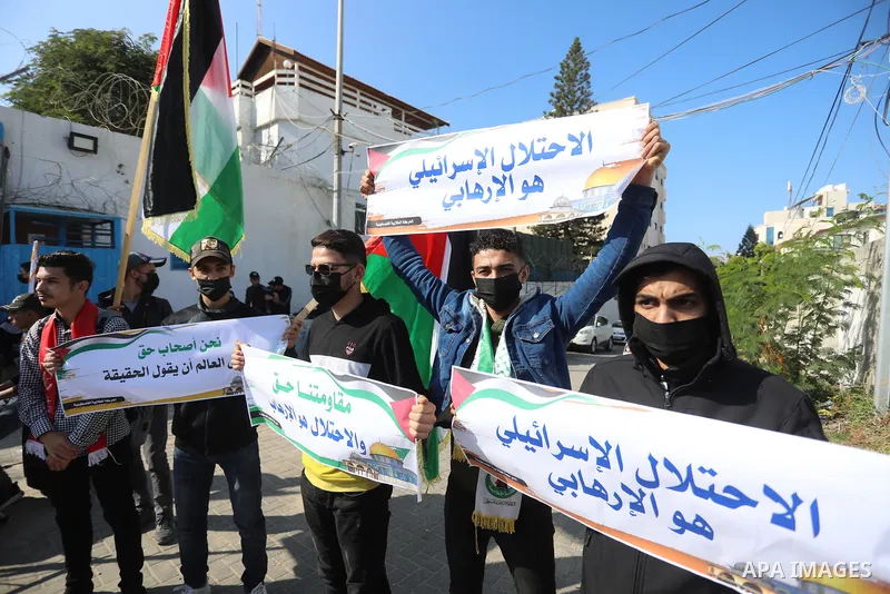 Palestinian students take part in a protest against the British Home Secretary Priti Patel decision to ban Hamas in front of the UNESCO headquarters, in Gaza city on November 22, 2021. Hamas has condemned a move by Brita...