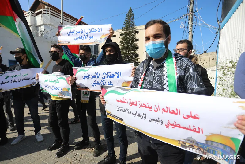 Palestinian students take part in a protest against the British Home Secretary Priti Patel decision to ban Hamas in front of the UNESCO headquarters, in Gaza city on November 22, 2021. Hamas has condemned a move by Brita...