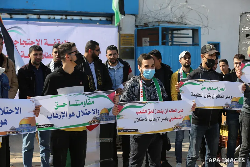 Palestinian students take part in a protest against the British Home Secretary Priti Patel decision to ban Hamas in front of the UNESCO headquarters, in Gaza city on November 22, 2021. Hamas has condemned a move by Brita...