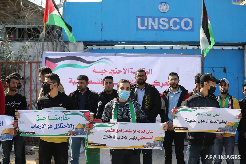 Palestinian students take part in a protest against the British Home Secretary Priti Patel decision to ban Hamas in front of the UNESCO headquarters, in Gaza city on November 22, 2021. Hamas has condemned a move by Brita...