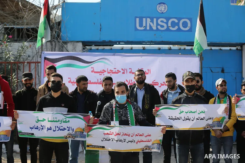 Palestinian students take part in a protest against the British Home Secretary Priti Patel decision to ban Hamas in front of the UNESCO headquarters, in Gaza city on November 22, 2021. Hamas has condemned a move by Brita...
