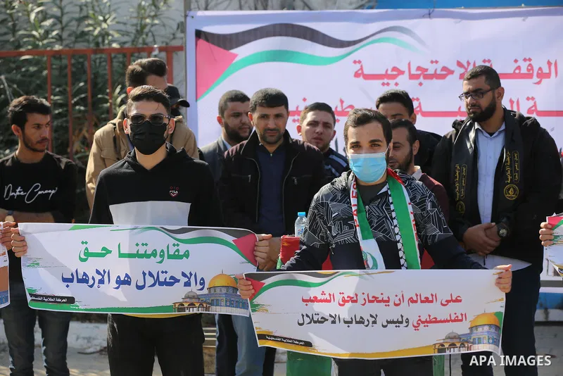 Palestinian students take part in a protest against the British Home Secretary Priti Patel decision to ban Hamas in front of the UNESCO headquarters, in Gaza city on November 22, 2021. Hamas has condemned a move by Brita...