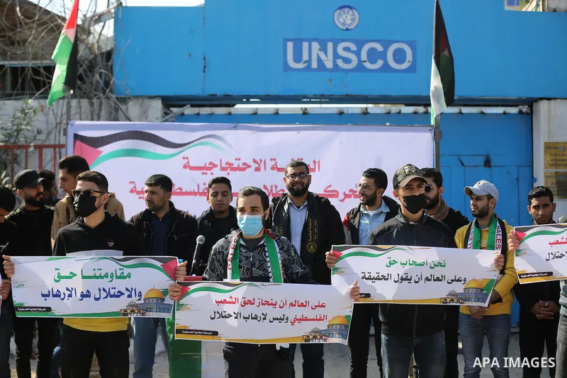 Palestinian students take part in a protest against the British Home Secretary Priti Patel decision to ban Hamas in front of the UNESCO headquarters, in Gaza city on November 22, 2021. Hamas has condemned a move by Brita...