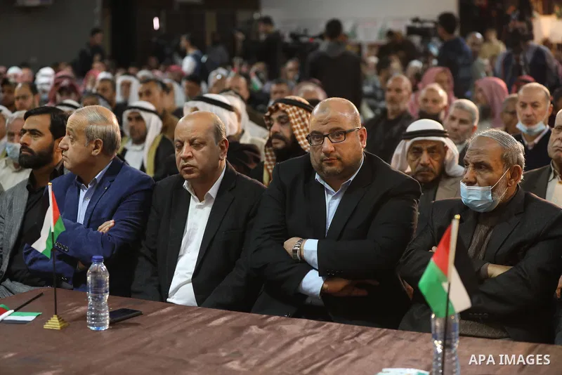 Palestinians take part in a rally against the British Home Secretary Priti Patel decision to ban Hamas, in Gaza City on November 23, 2021. Showing support for Hamas in Britain could be punished with 14 years in prison if...