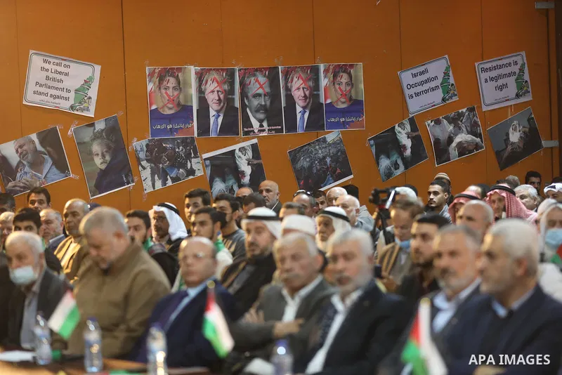 Palestinians take part in a rally against the British Home Secretary Priti Patel decision to ban Hamas, in Gaza City on November 23, 2021. Showing support for Hamas in Britain could be punished with 14 years in prison if...