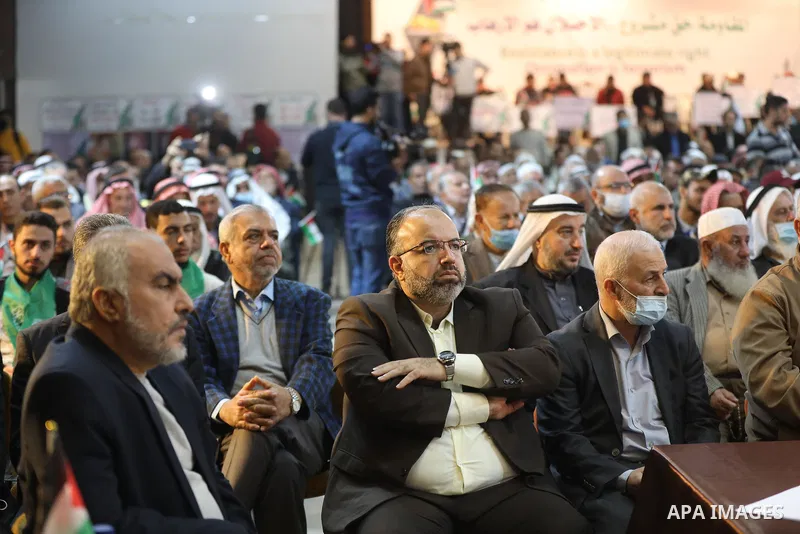 Palestinians take part in a rally against the British Home Secretary Priti Patel decision to ban Hamas, in Gaza City on November 23, 2021. Showing support for Hamas in Britain could be punished with 14 years in prison if...