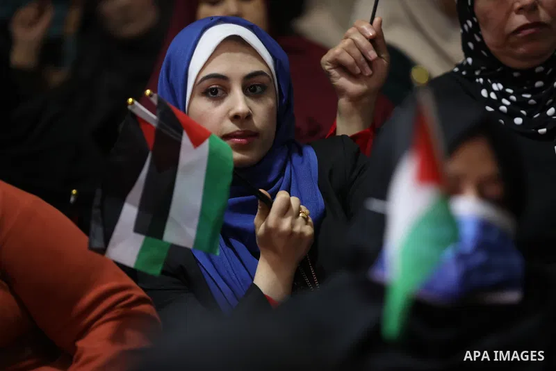 Palestinians take part in a rally against the British Home Secretary Priti Patel decision to ban Hamas, in Gaza City on November 23, 2021. Showing support for Hamas in Britain could be punished with 14 years in prison if...