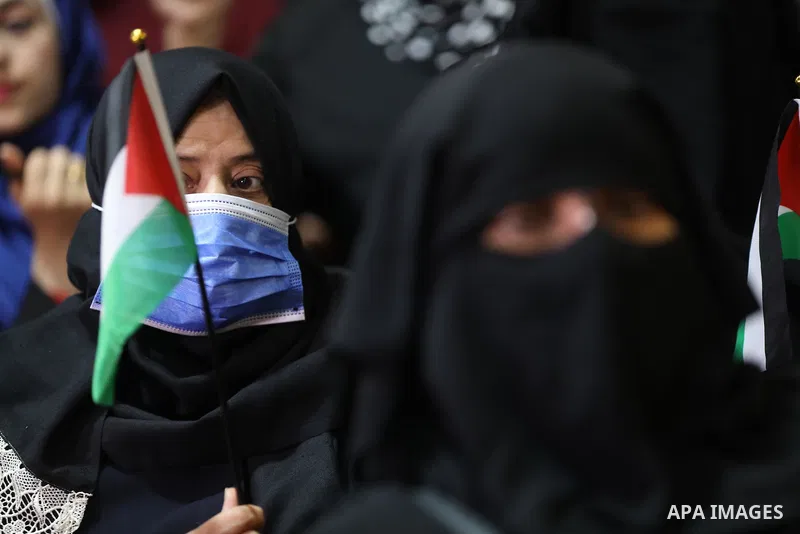 Palestinians take part in a rally against the British Home Secretary Priti Patel decision to ban Hamas, in Gaza City on November 23, 2021. Showing support for Hamas in Britain could be punished with 14 years in prison if...