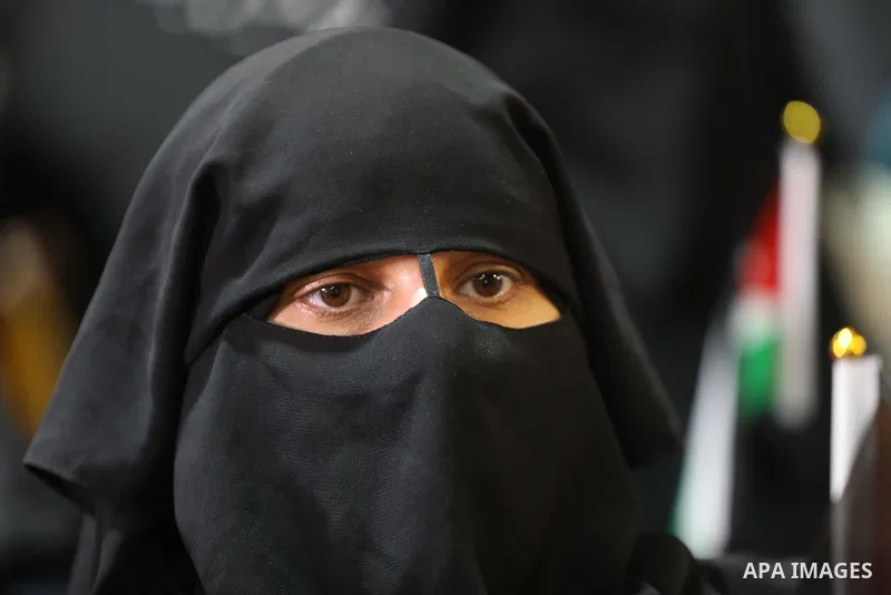 Palestinians take part in a rally against the British Home Secretary Priti Patel decision to ban Hamas, in Gaza City on November 23, 2021. Showing support for Hamas in Britain could be punished with 14 years in prison if...