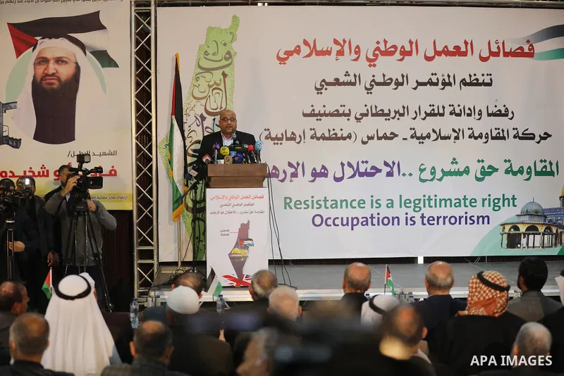 Palestinians take part in a rally against the British Home Secretary Priti Patel decision to ban Hamas, in Gaza City on November 23, 2021. Showing support for Hamas in Britain could be punished with 14 years in prison if...