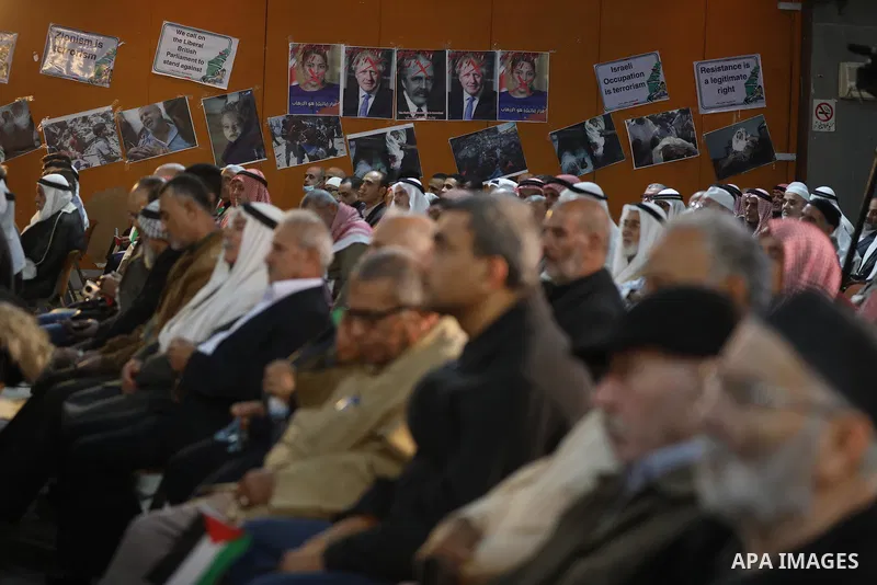 Palestinians take part in a rally against the British Home Secretary Priti Patel decision to ban Hamas, in Gaza City on November 23, 2021. Showing support for Hamas in Britain could be punished with 14 years in prison if...