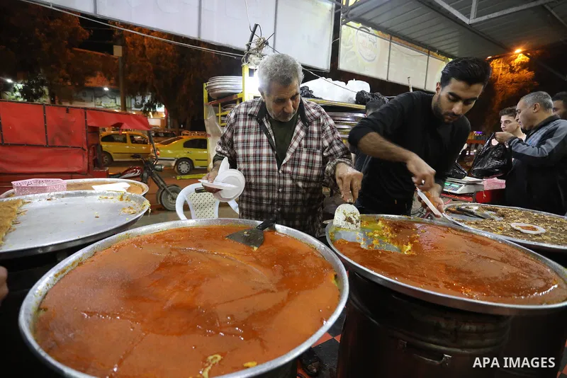Masoud Al-Qatati, a Palestinian man sells sweets low prices and sometimes free for customers due to the difficult economic conditions of the residents of the Gaza Strip, in Gaza city on November 23, 2021. Al-Qatati said...
