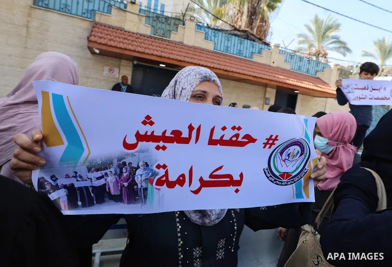 Palestinians of Social Affairs take part in a protest to demand the payment of their allowances, in front of United Nations Development Programme office (UNDP) in Gaza city November 24, 2021. Head of EU’s media office in...