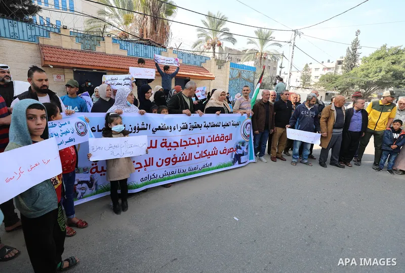 Palestinians of Social Affairs take part in a protest to demand the payment of their allowances, in front of United Nations Development Programme office (UNDP) in Gaza city November 24, 2021. Head of EU’s media office in...