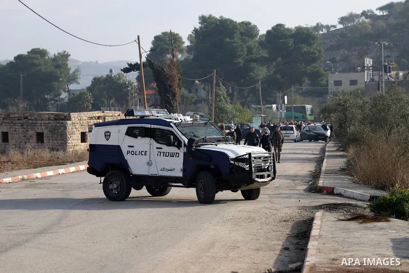 Israeli forces and Palestinian demonstrators clash in the village of al-Lubban al-Sharqiya in the Israeli-occupied West Bank on November 25, 2021. Photo by Wajed Nobani