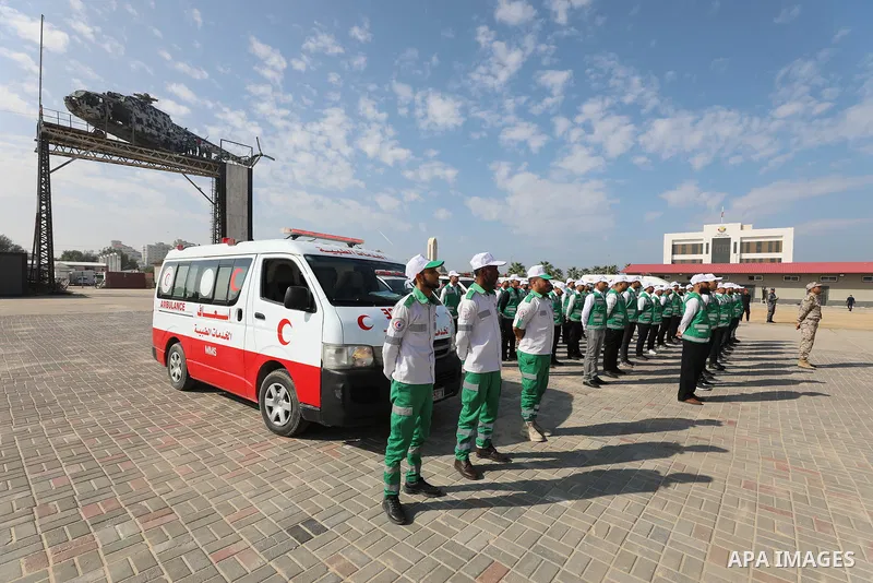 Palestinian ambulance officers show their skills during a graduation ceremony, in Gaza city on November 25, 2021. Photo by Ramadan El-Agha