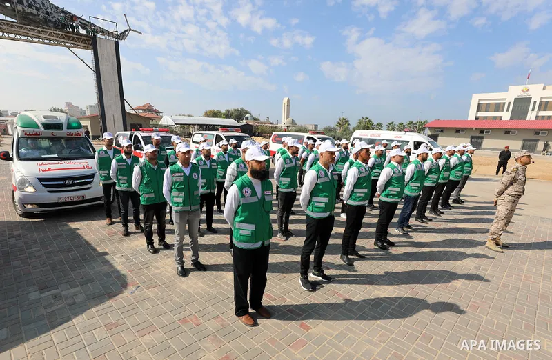 Palestinian ambulance officers show their skills during a graduation ceremony, in Gaza city on November 25, 2021. Photo by Ramadan El-Agha