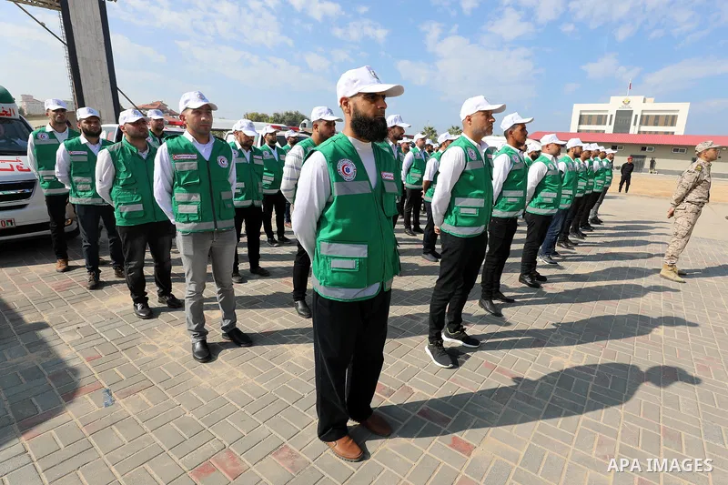 Palestinian ambulance officers show their skills during a graduation ceremony, in Gaza city on November 25, 2021. Photo by Ramadan El-Agha