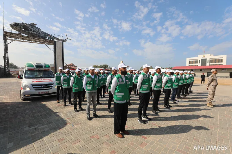 Palestinian ambulance officers show their skills during a graduation ceremony, in Gaza city on November 25, 2021. Photo by Ramadan El-Agha