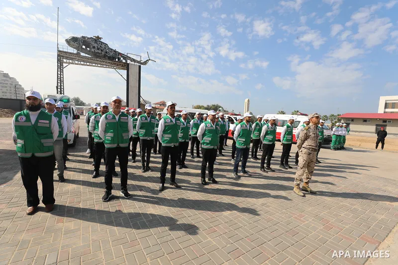 Palestinian ambulance officers show their skills during a graduation ceremony, in Gaza city on November 25, 2021. Photo by Ramadan El-Agha
