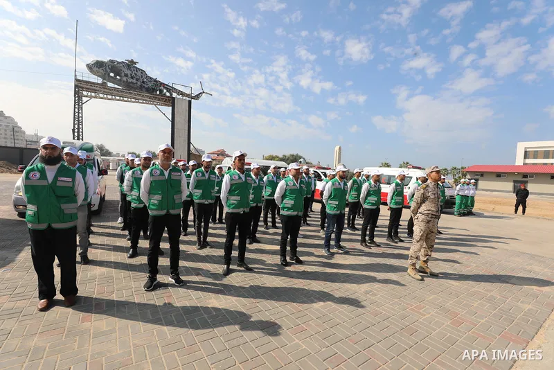 Palestinian ambulance officers show their skills during a graduation ceremony, in Gaza city on November 25, 2021. Photo by Ramadan El-Agha