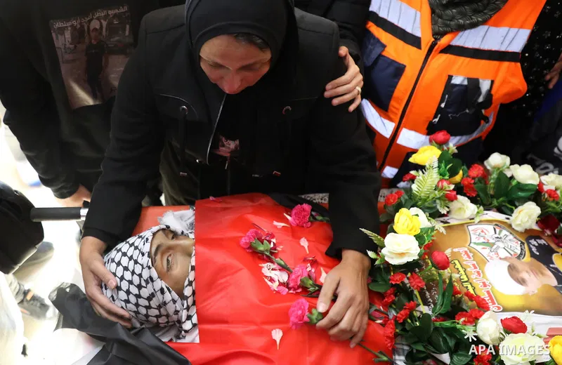 Palestinians attend the funeral of Amjad Abu Sultan, 14, who was shot killed by Israeli forces last month, in the West Bank city of Bethlehem, on Nov. 26, 2021. Photo by Abedalrahman Hassan