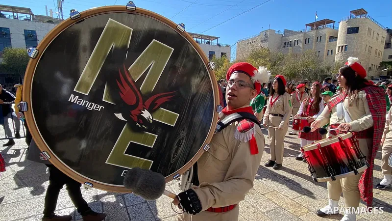 Scout parade as Custodian of the Holy Land, Father Francesco Patton leads a mass at the Church of the Nativity to ceremonially launch the beginning of the Christmas season, in the West Bank city of Bethlehem November 27,...