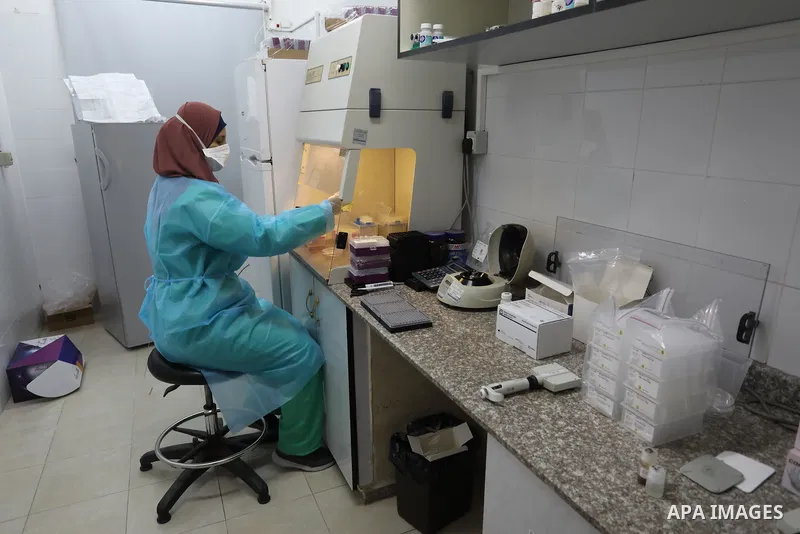 Palestinian Laboratory Medicine Specialist, tests vials of samples for coronavirus at Medical Laboratory, in Gaza city on November 28, 2021. In the past week a heavily mutated Covid variant has been identified, rapidly l...