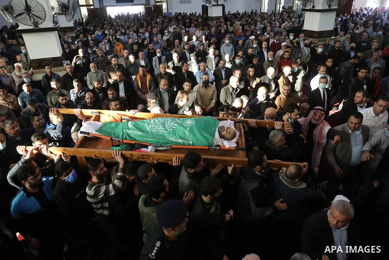 Palestinians attend the funeral of Hamas leader Abd al-Salam Siam who died of the coronavirus (COVID-19) pandemic in Gaza City, on November 29, 2021. Photo by Ashraf Amra
