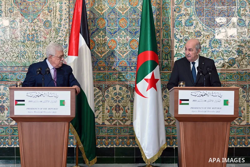 Palestinian president Mahmoud Abbas meets with Algerian President Abdelmadjid Tebboune, Algiers, Algeria on December 6, 2021. Photo by Thaer Ganaim