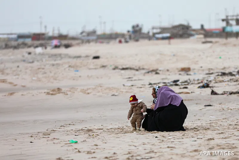 Palestinians enjoy their time on the beach, in Gaza City, On December 6, 2021. The beach is one of the few open public spaces in this densely populated city. Photo by Atia Darwish