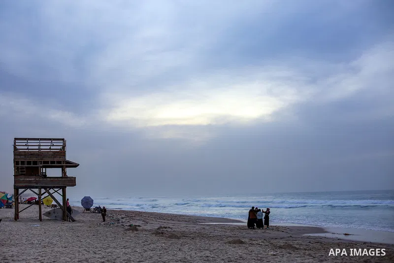 Palestinians enjoy their time on the beach, in Gaza City, On December 6, 2021. The beach is one of the few open public spaces in this densely populated city. Photo by Atia Darwish