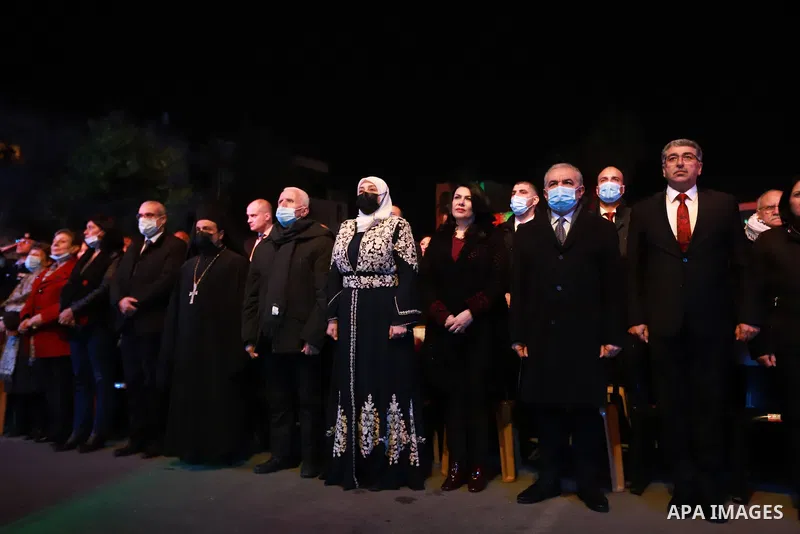Palestinian Prime Minister Mohammed Ishtayeh attends a Christmas tree lighting in the West Bank city of Ramallah on December 6, 2021. Photo by Ibrahim Atta