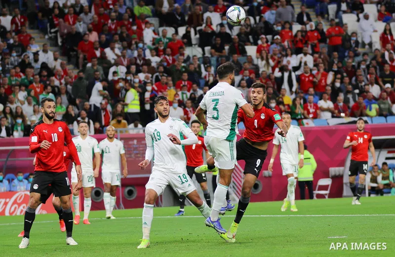Egyptian football team players fight with Algerian football team players during the FIFA Arab Cup 2021 group D football match at the Al-Janoub Stadium in the Qatari city of Al-Wakrah on December 7, 2021. Photo by Youssef...