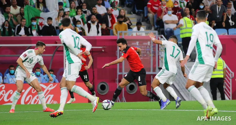 Egyptian football team players fight with Algerian football team players during the FIFA Arab Cup 2021 group D football match at the Al-Janoub Stadium in the Qatari city of Al-Wakrah on December 7, 2021. Photo by Youssef...