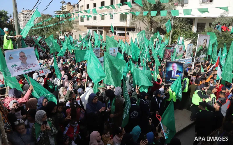 Palestinian Hamas supporters take part during a rally marking the 34th anniversary of the founding of the Hamas movement, in Gaza city on December 10, 2021. Photo by Omar Ashtawy