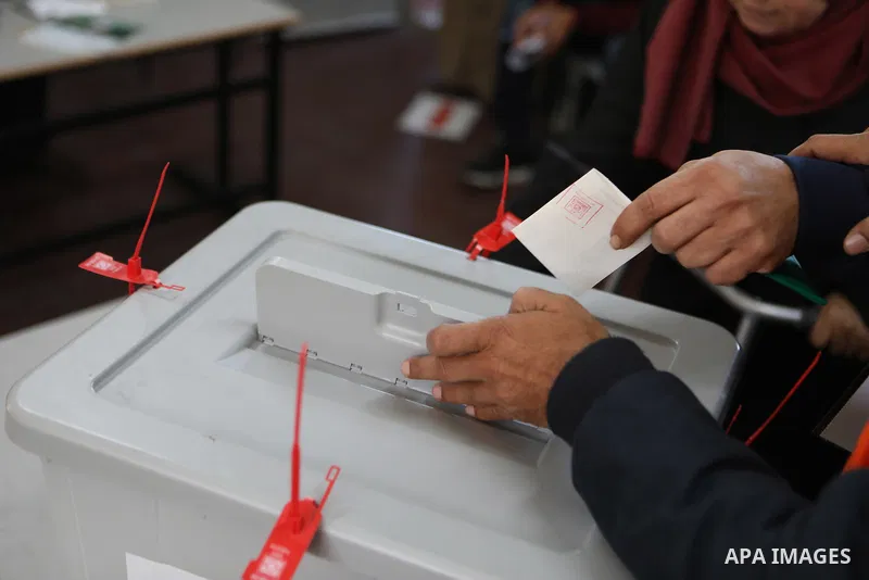 Palestinian voters cast their vote in the first phase of local elections in the West Bank city of Hebron on December 11, 2021. Polls opened this morning for the first phase of local elections at 154 Palestinian localitie...