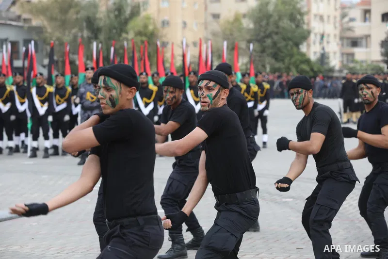 Members of Palestinian security forces take part in a graduation ceremony in Gaza City December 12, 2021. Photo by Ashraf Amra