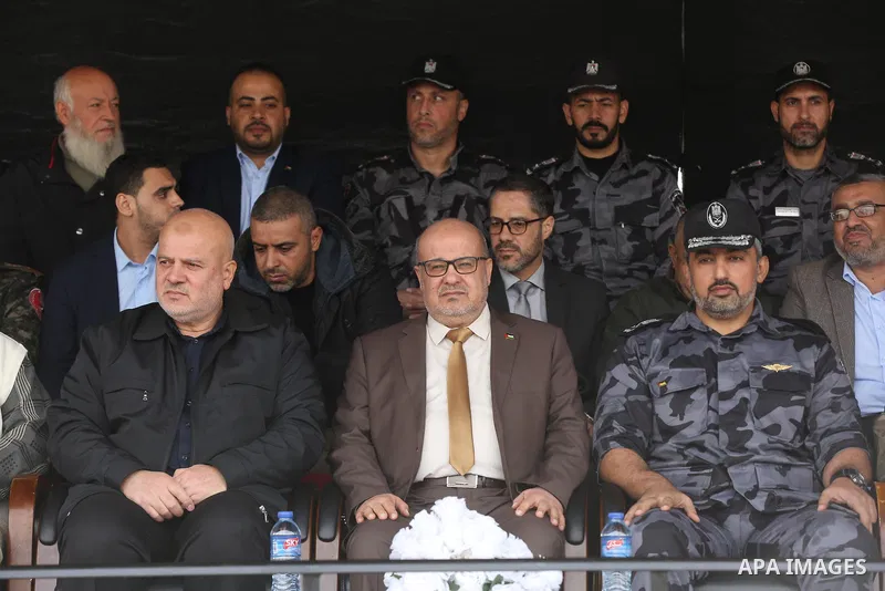 Head of government administration in Gaza Strip, Essam Al-Dalis attends a graduation ceremony in Gaza City December 12, 2021. Photo by Ashraf Amra