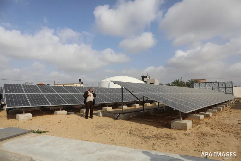 Palestinians from the Ministry of Health and a Japanese delegation attend the handover cermony for reconstruction and strengthening the electricity supply system with renewable energy at the European Gaza Hospital ​in th...