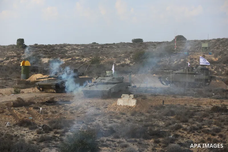 Palestinian factions militants take part in joint military exercise, in Rafah in the southern of Gaza strip on December 29, 2021. Photo by Ashraf Amra