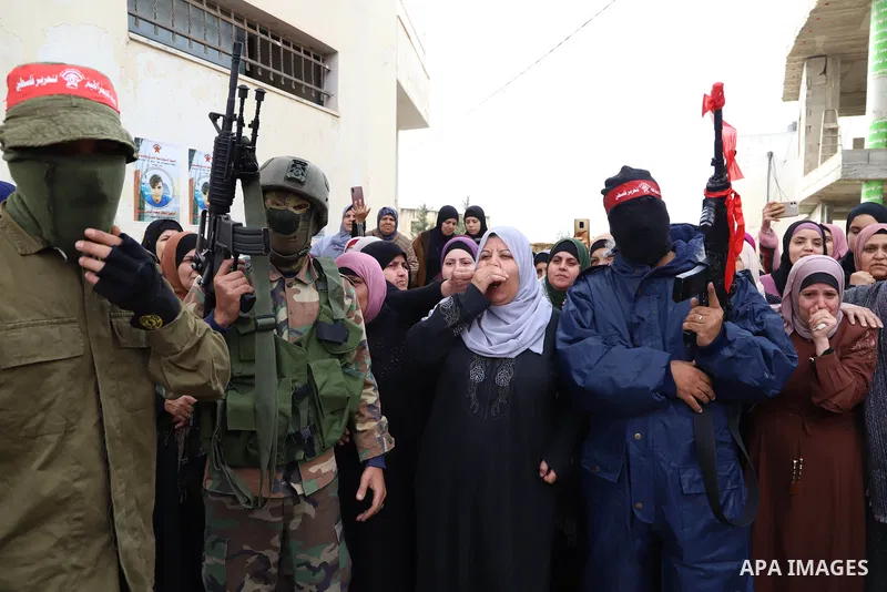Palestinians carry the body of Mohammad Mater who was shot killed by Israeli forces, during his funeral in the West Bank city of Ramallah, on December 4, 2021. Israeli authorities yesterday handed over the body of Mohamm...