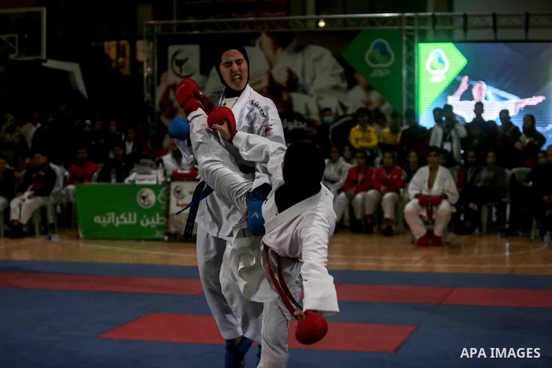 Palestinian players fight during "Palestine Karate championship 2021", in Gaza city on December 3, 2021. Photo by Mohammed Dahman
