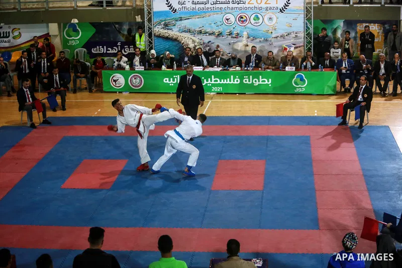 Palestinian players fight during "Palestine Karate championship 2021", in Gaza city on December 3, 2021. Photo by Mohammed Dahman